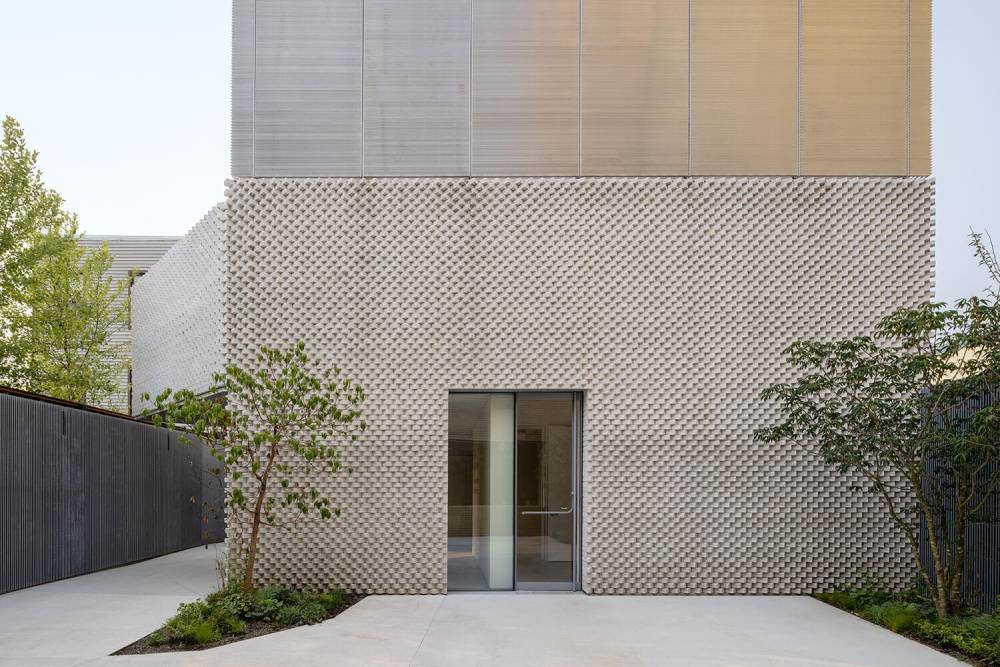 White box facade of the Amant Foundation