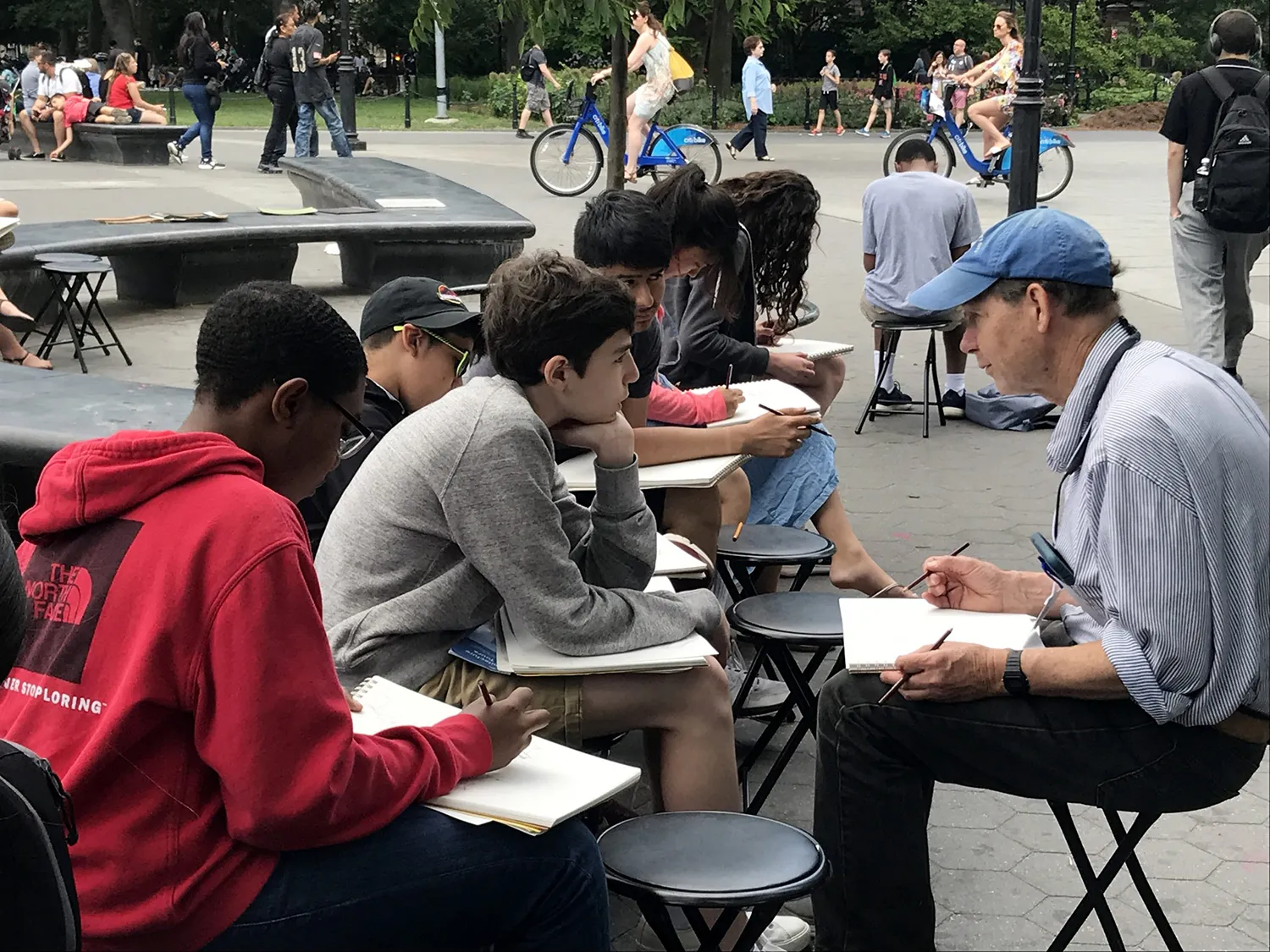 Students sketch outdoors