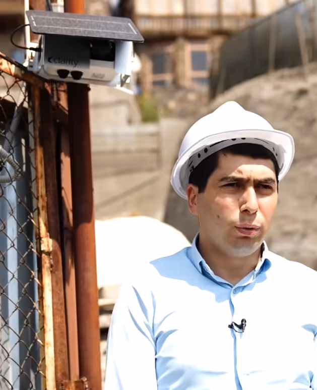 Clarity Node-S air quality sensor being installed at a construction site in Yerevan, Armenia, for real-time dust monitoring.