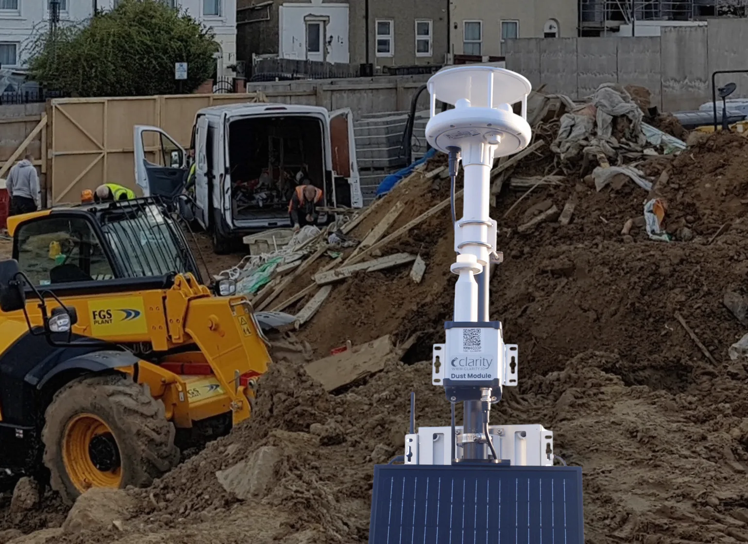 Clarity Dust Module and Node-S with solar panel mounted at the boundary of a UK construction site for MCERTS-certified PM10 dust monitoring.