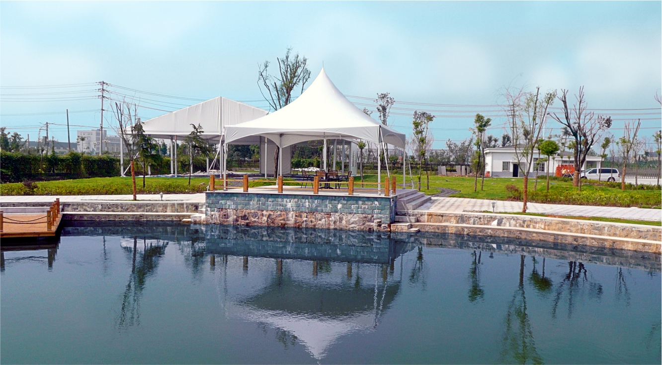 White tent beside a reflecting pool, from the original RhinoTex homepage