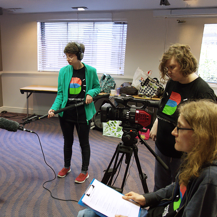 Sally Philips smiling at the camera.