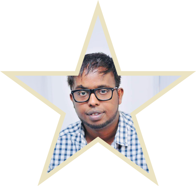 Ambassador Nick sitting in armchair