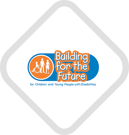 Building for the Future logo with an icon of children and a wheelchair user, and the text “Building for the Future” inside a silver diamond border.