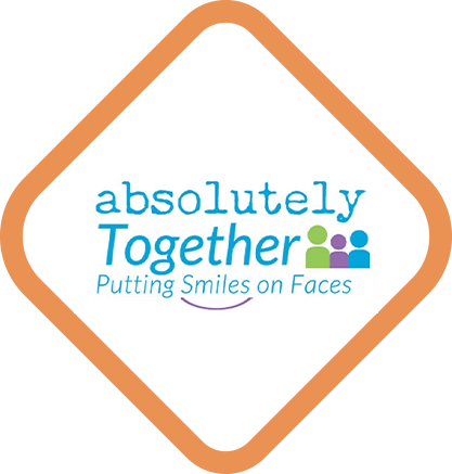 Absolutely Together logo with the words “Putting Smiles on Faces” and three small figures, inside a bronze diamond border