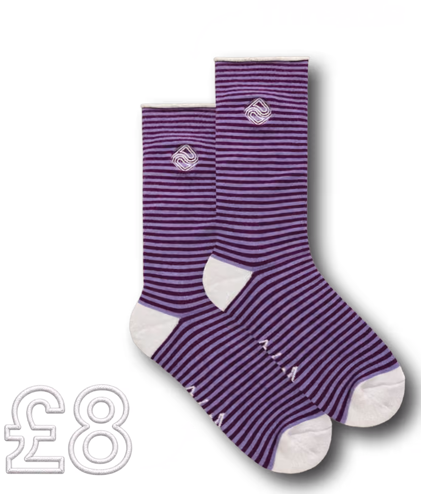 Two purple-and-lilac striped socks with white heels and toes on a black background. Large white text reads, “How much is a pair of socks?” beside a purple price tag showing “£8”