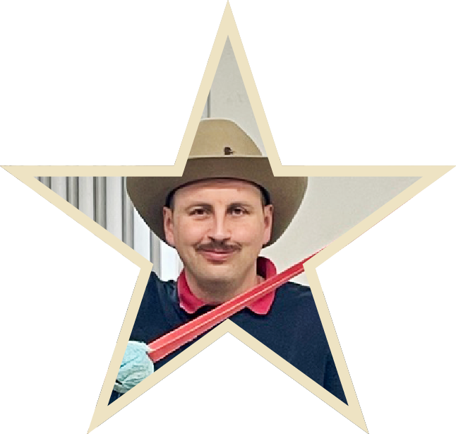 Marcus Mason-Williams in a cowboy hat and red neckerchief