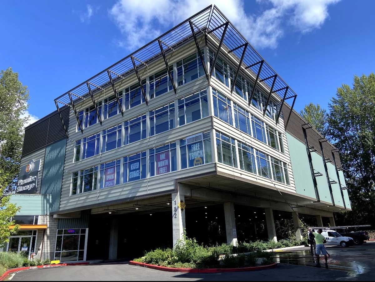Exterior of 4 story building with many windows