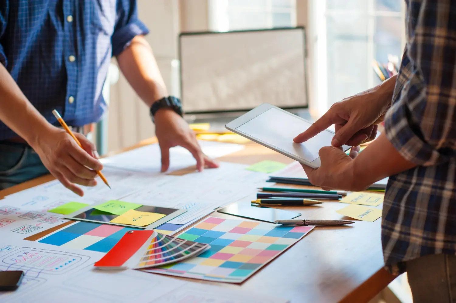Branding design process with creative concepts, sketches, and digital design tools