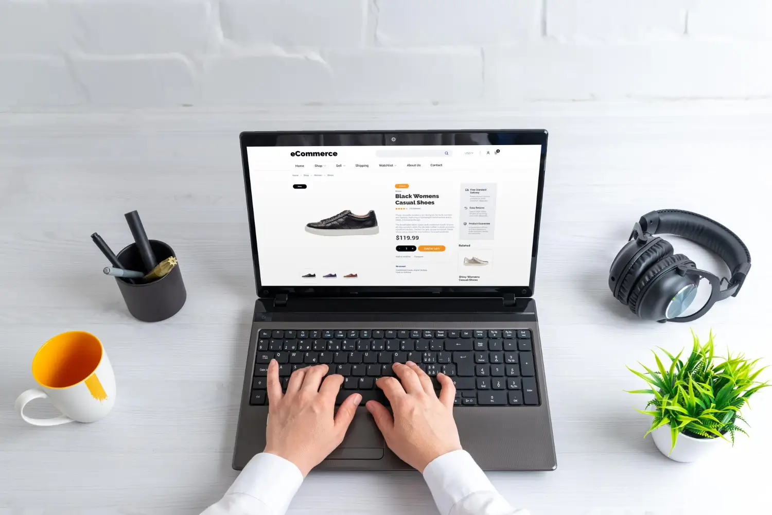 E-commerce website development with online store product page displayed on a laptop