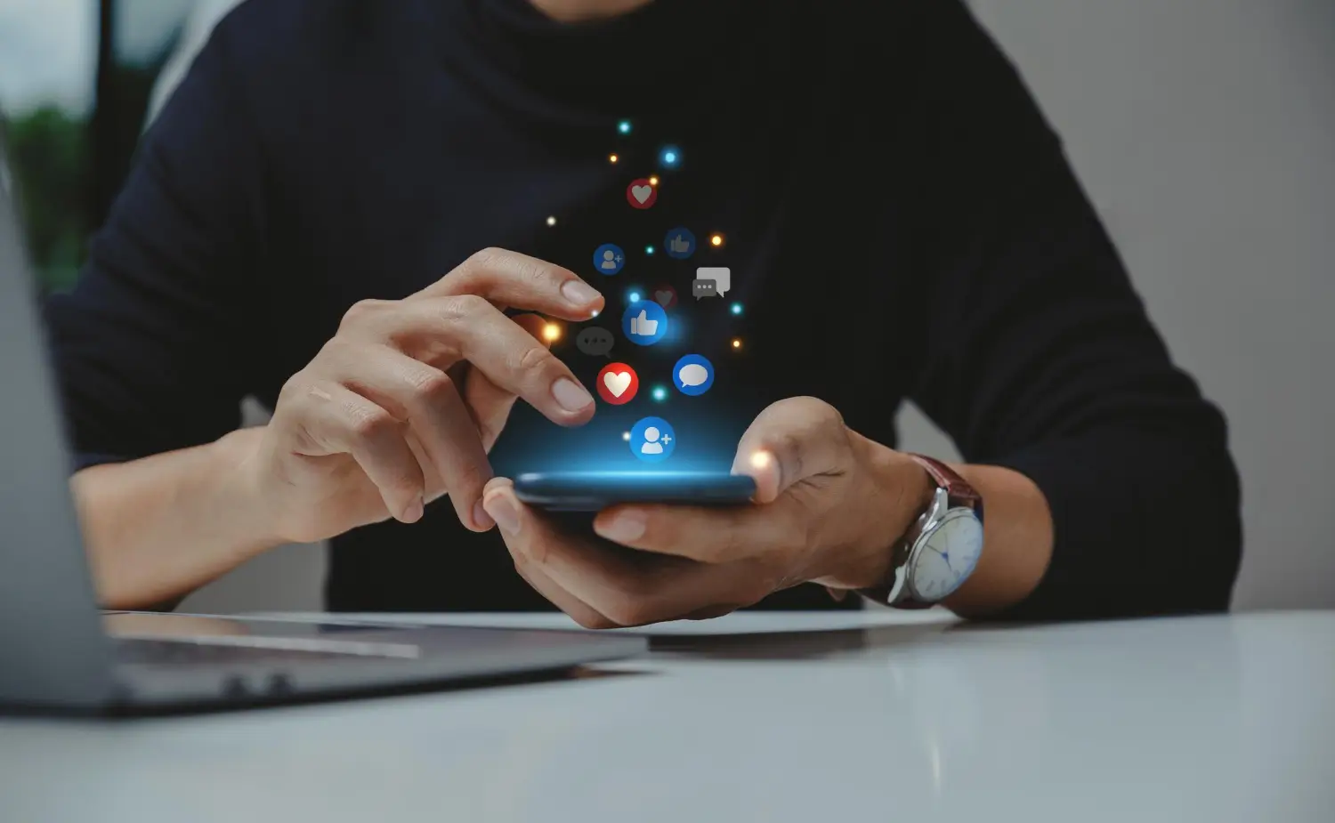 Social media marketing strategy with social engagement icons on a smartphone