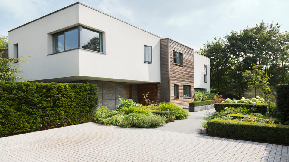 Maison individuelle moderne en Suisse – logement en propriété pouvant être concerné par la suppression de la valeur locative.