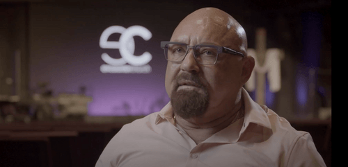 A person in glasses looking at something