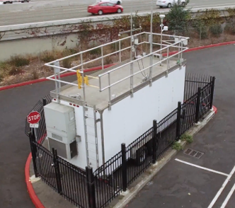 A Clarity Node colocated with a reference station in Oakland for wildfire smoke calibrations.