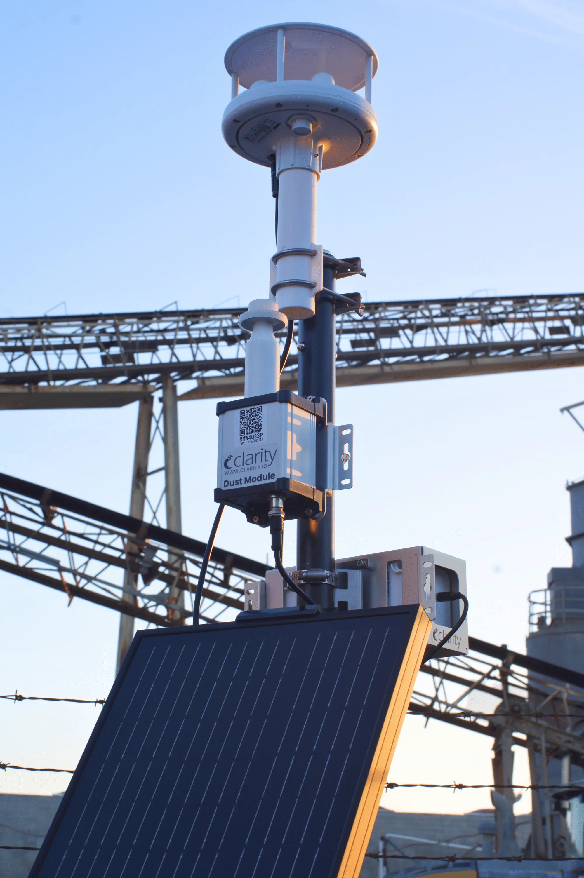 Solar-powered Clarity Dust Module deployed outside an industrial facility for accurate PM10 coarse particulate monitoring; advanced outdoor air quality sensor delivering the best option for PM10 measurement on the market.