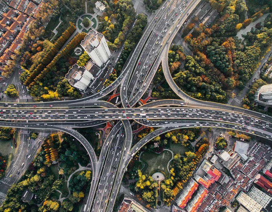 Aerial photography of concrete roads by Denys Nevozhai via Unsplash