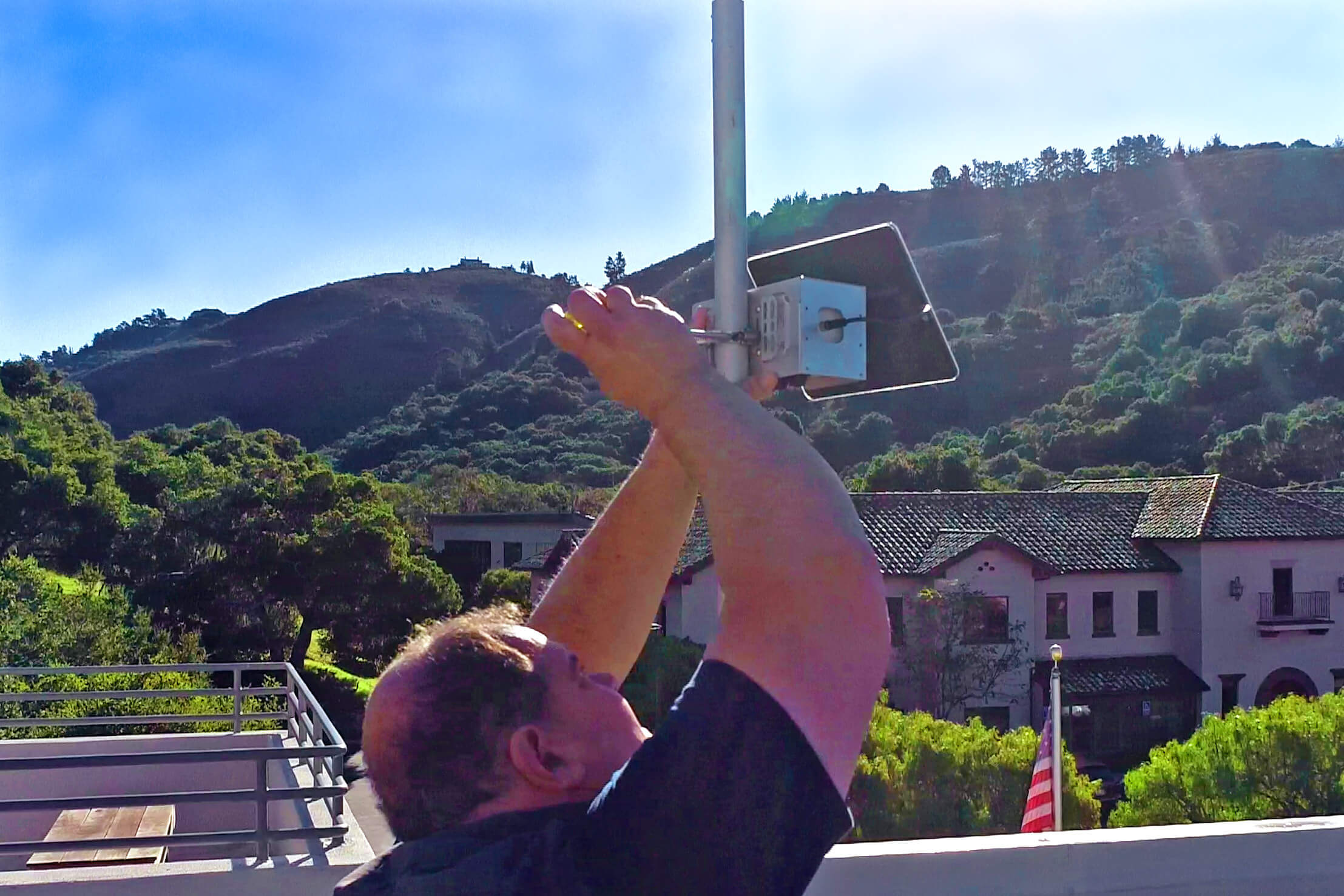 A low-cost air quality sensor is installed at a site by Monterey Bay Air Resources District (MBARD).