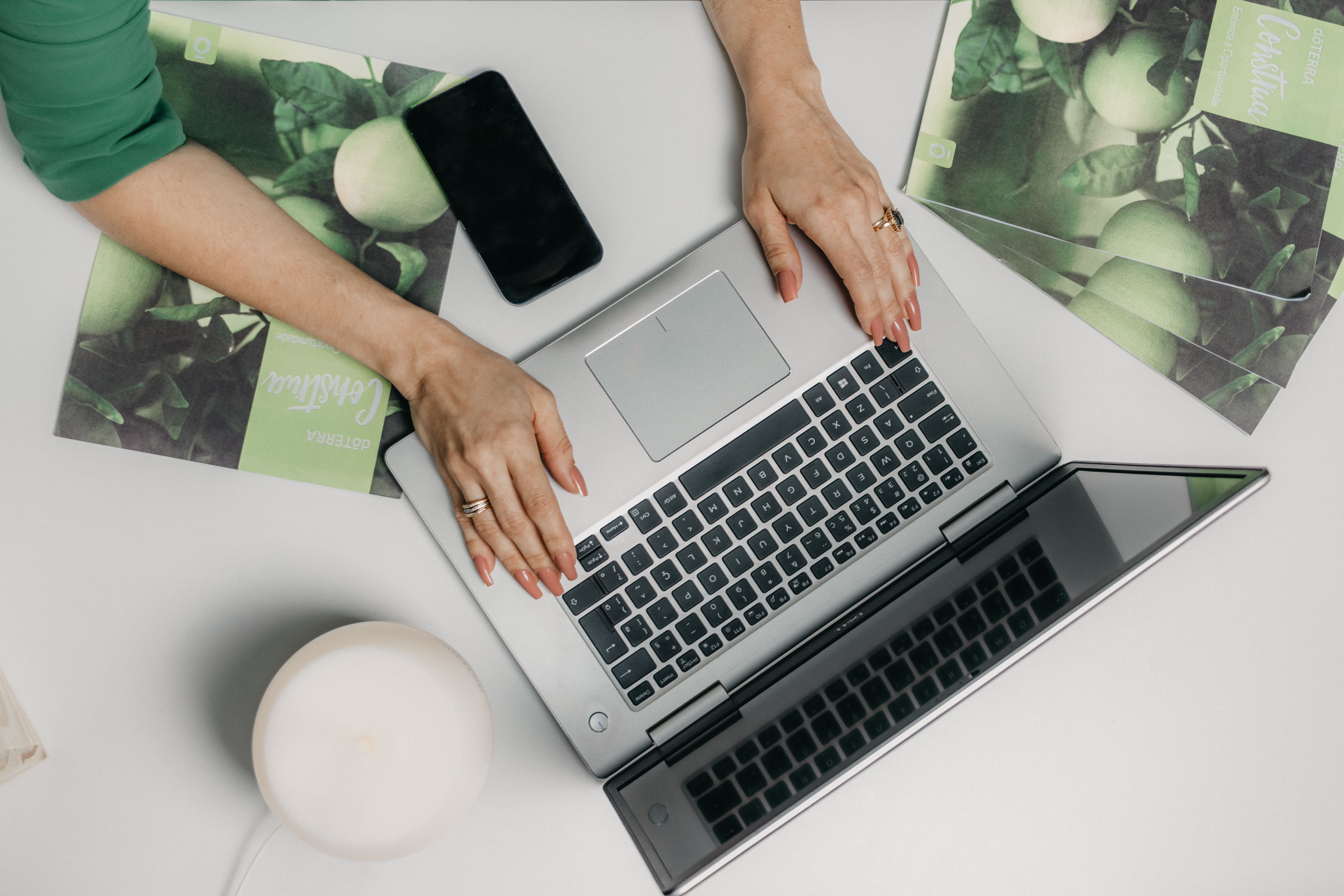 Image of person typing on a keyboard