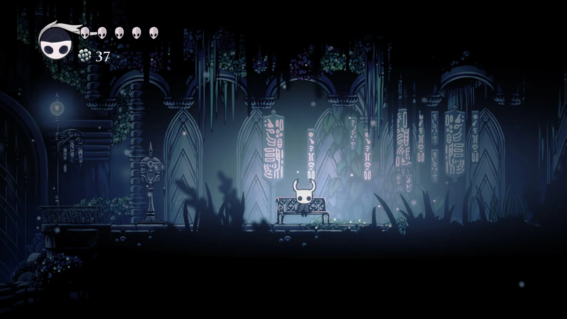 A still from the gameplay of a 2D game Hollow Knight.