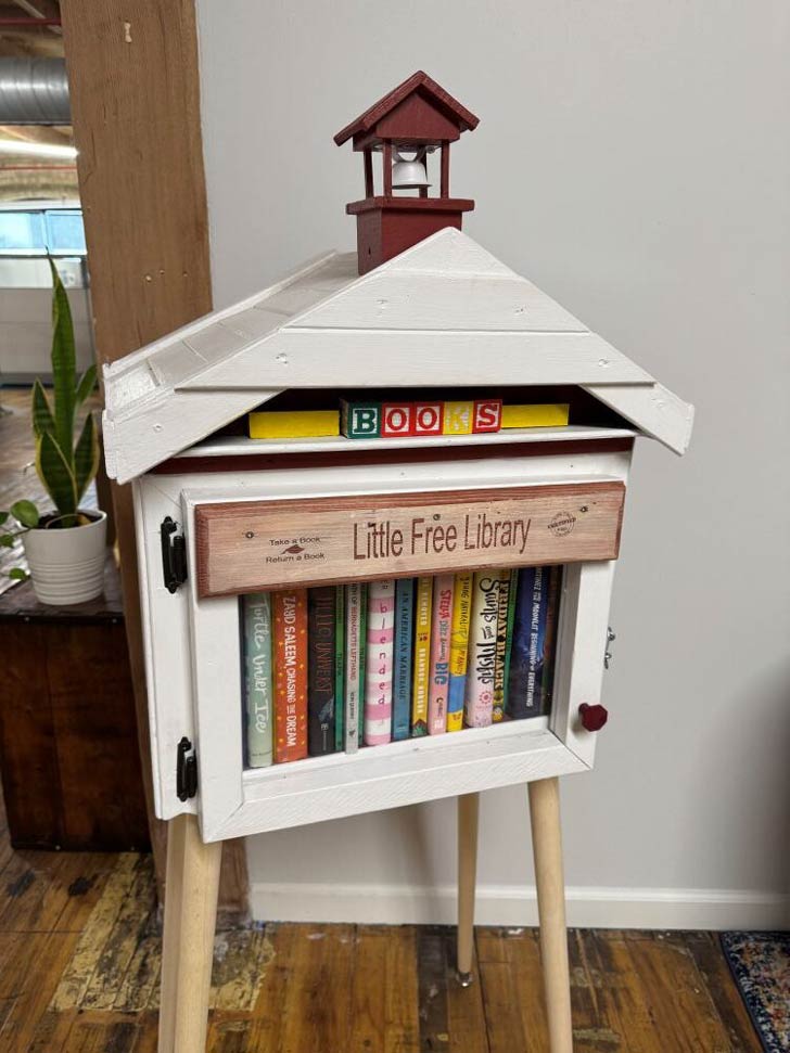 A Little Free Library that looks like a one-room schoolhouse