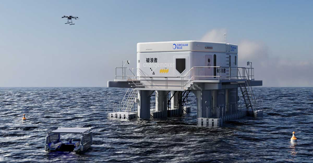 A small lab and garbage collector called CircularBlue sits on stilts in the middle of the ocean