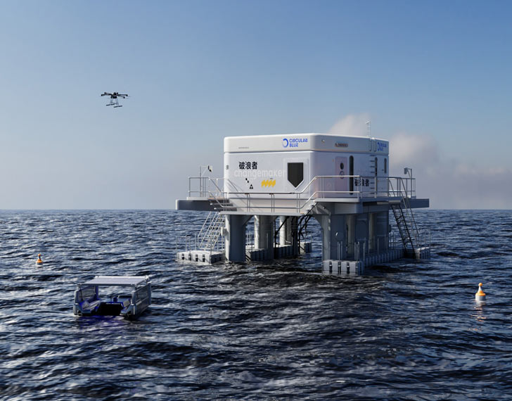 A small lab and garbage collector called CircularBlue sits on stilts in the middle of the ocean