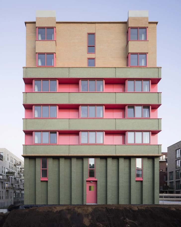 A building with green, pink, and cream brick in the Netherlands