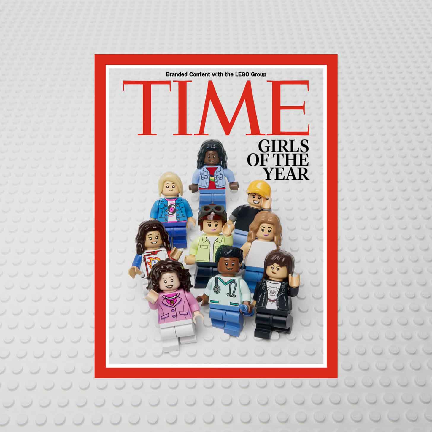 TIME Magazine cover with 9 diverse LEGO girls on the cover. The subhead reads: Girls of the year."