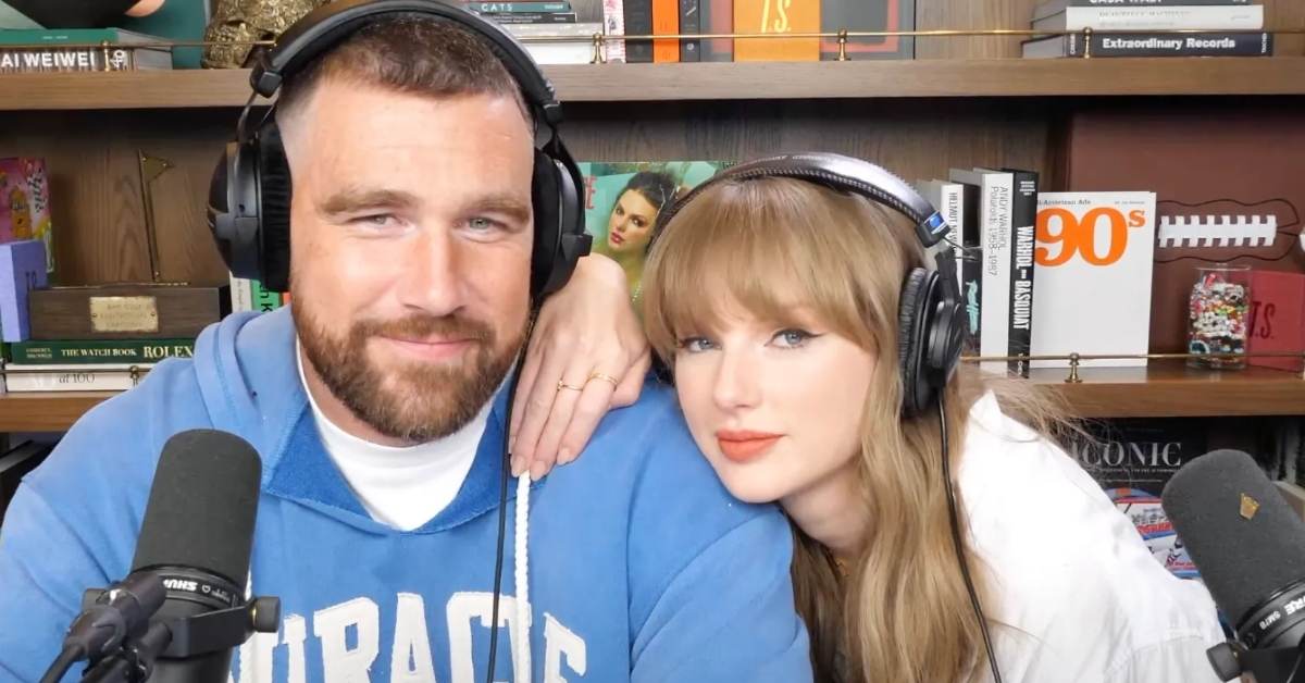 Travis Kelce and Taylor Swift pose for a camera in a screenshot from their Youtube Video: Taylor Swift on Reclaiming Her Masters, Wrapping The Eras Tour, and The Life of a Showgirl | NHTV