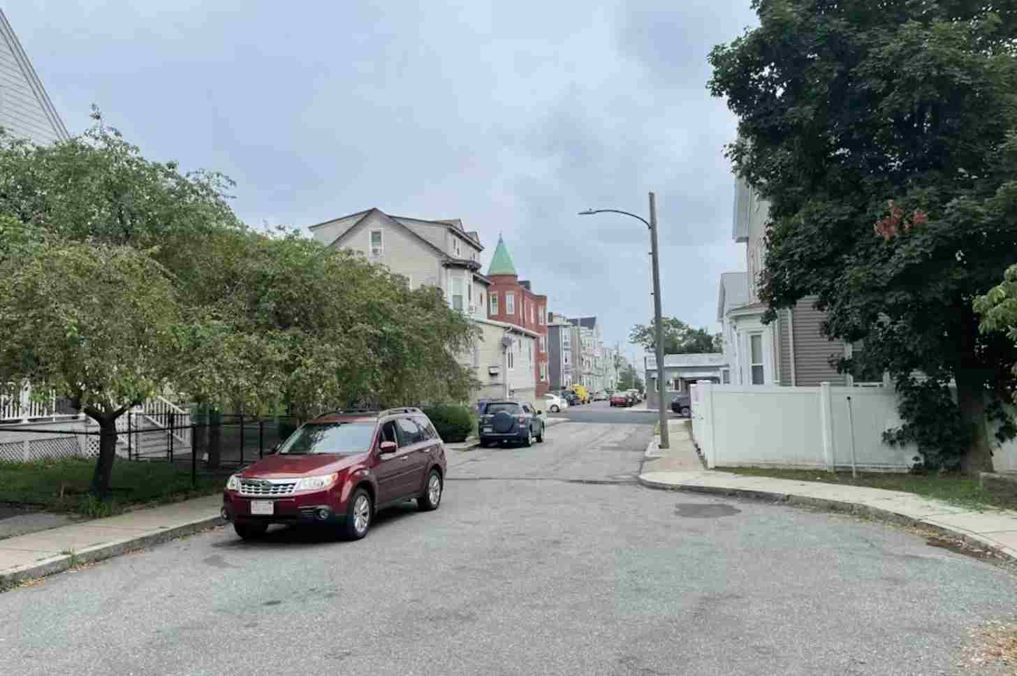 A street with trees.