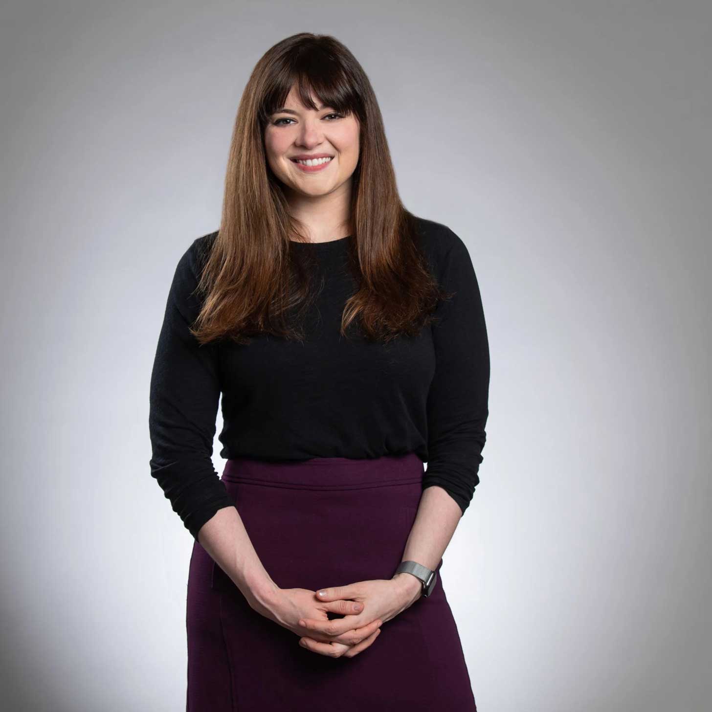 Amanda Litman, a woman with white skin and long brunette hair with bangs