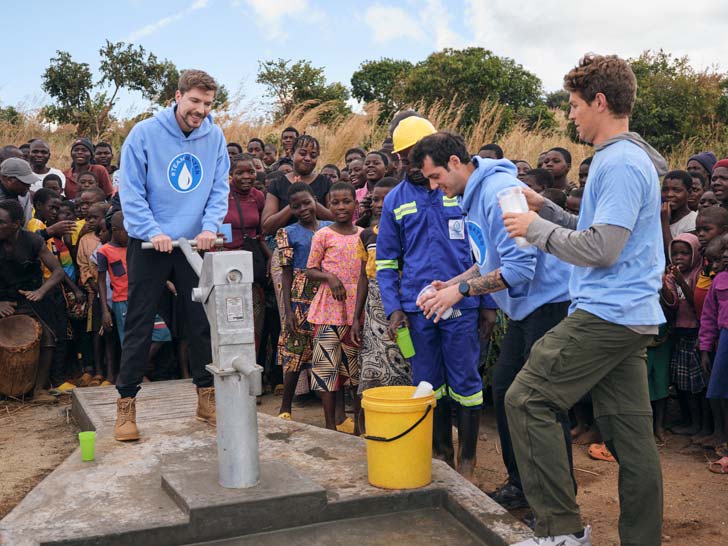 MrBeast, or Jimmy Donaldson, is joined by two other TeamWater supporters as they set up a well in a village.