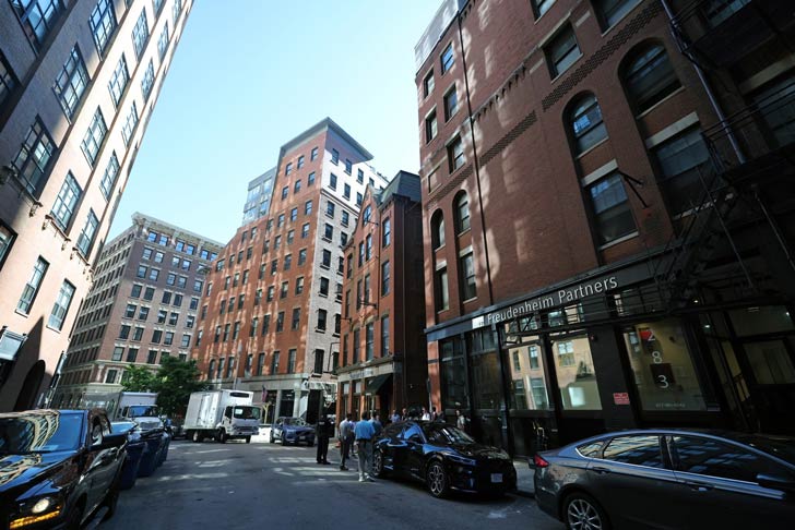 A street view of historic office buildings in downtown Boston, Massachusetts