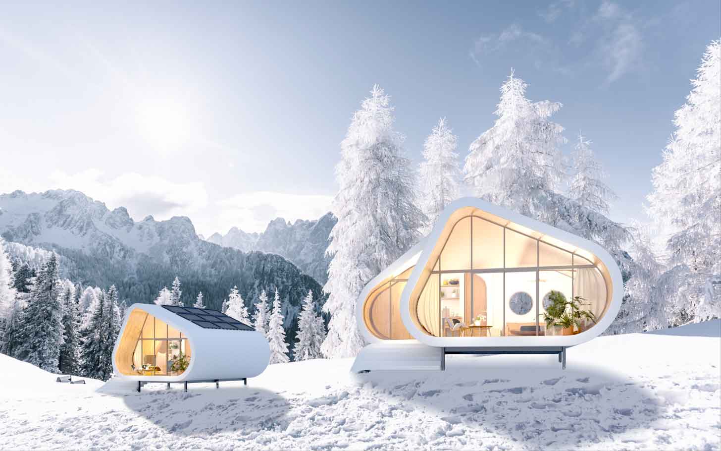 A rendering of two pod-like homes on a snowy terrain