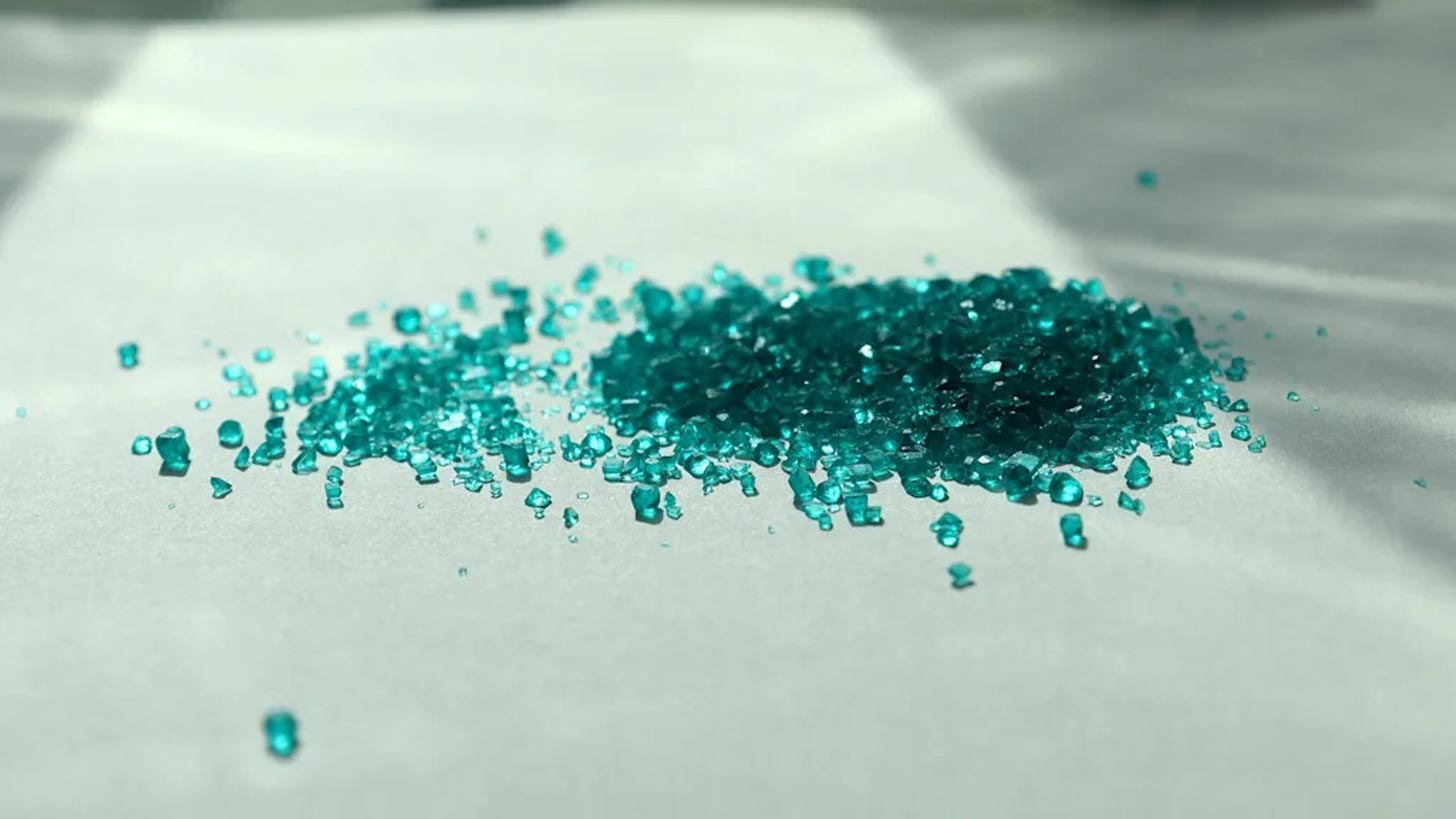 Small blue crystals of nickel mineral