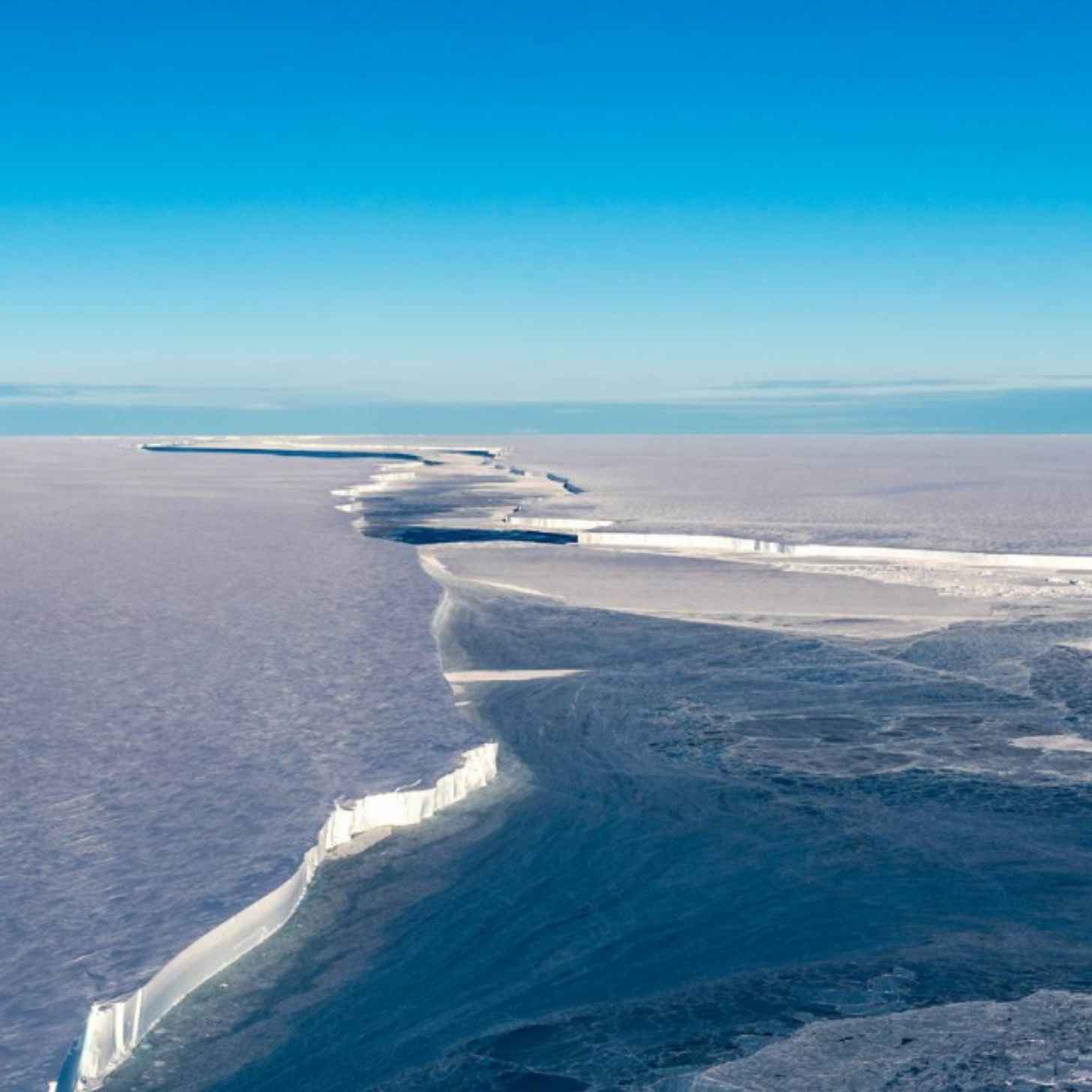 An ice shelf in Antarctica photographed from overhead.