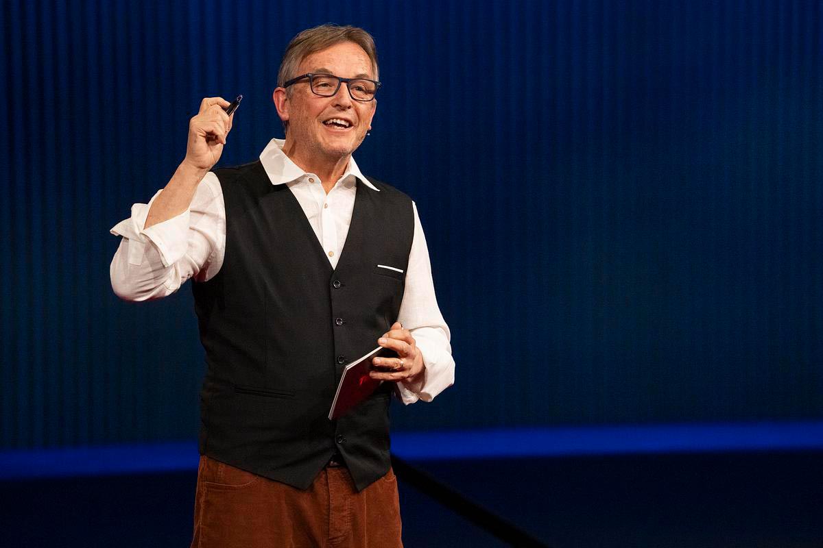 Chris Anderson speaks on stage at TED 2025