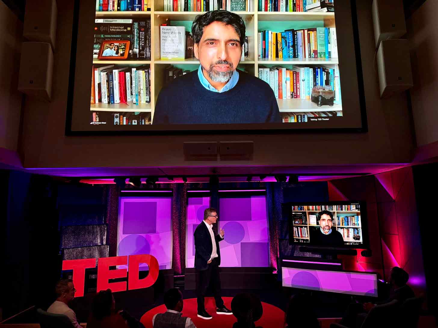 Sal Khan livestreams in at a TED announcement event in New York City