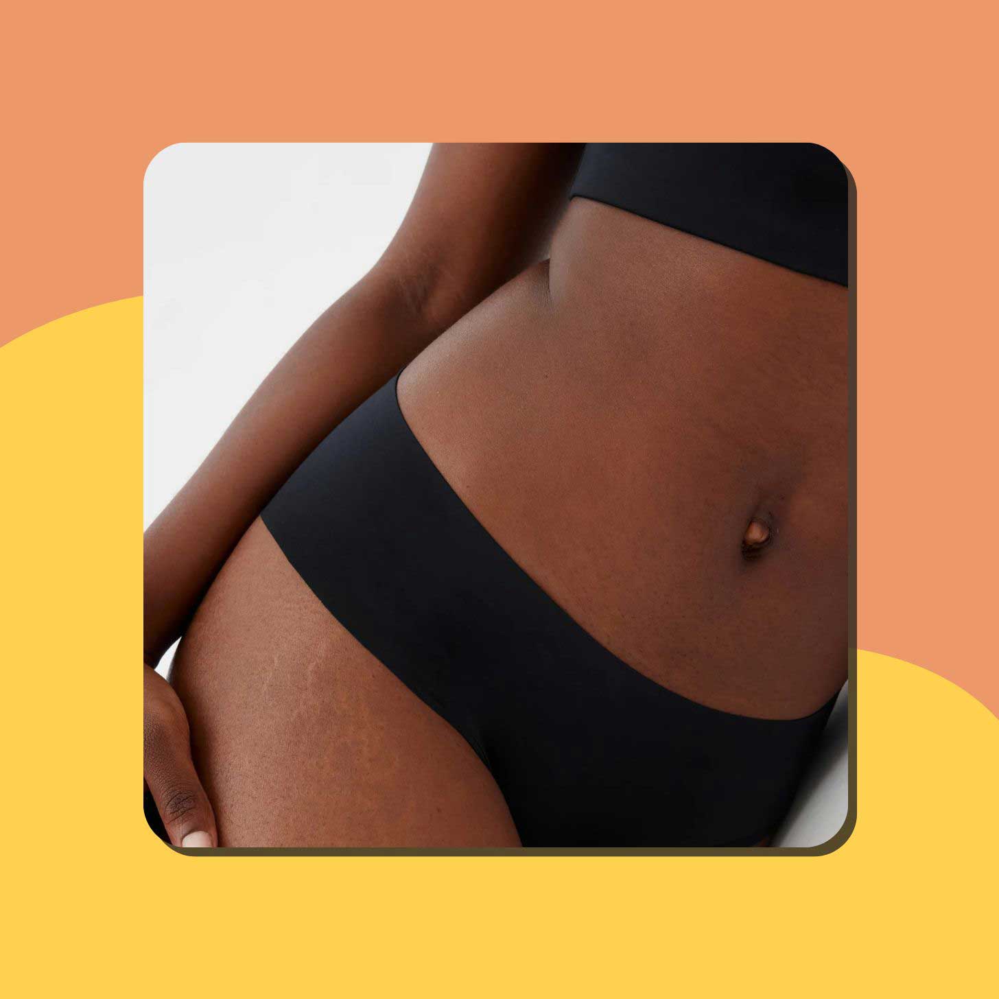 A close-up of black underwear on a woman's body