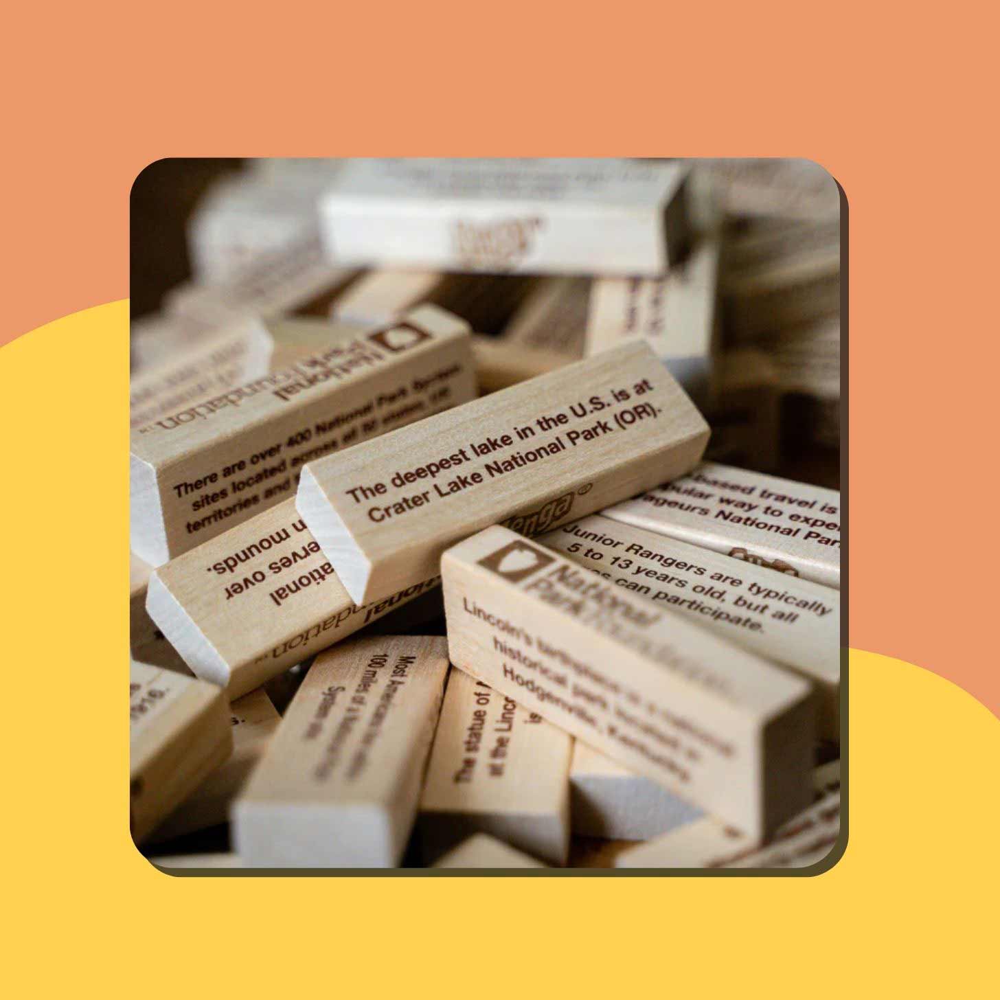 Wooden Jenga blocks inscribed with facts about national parks