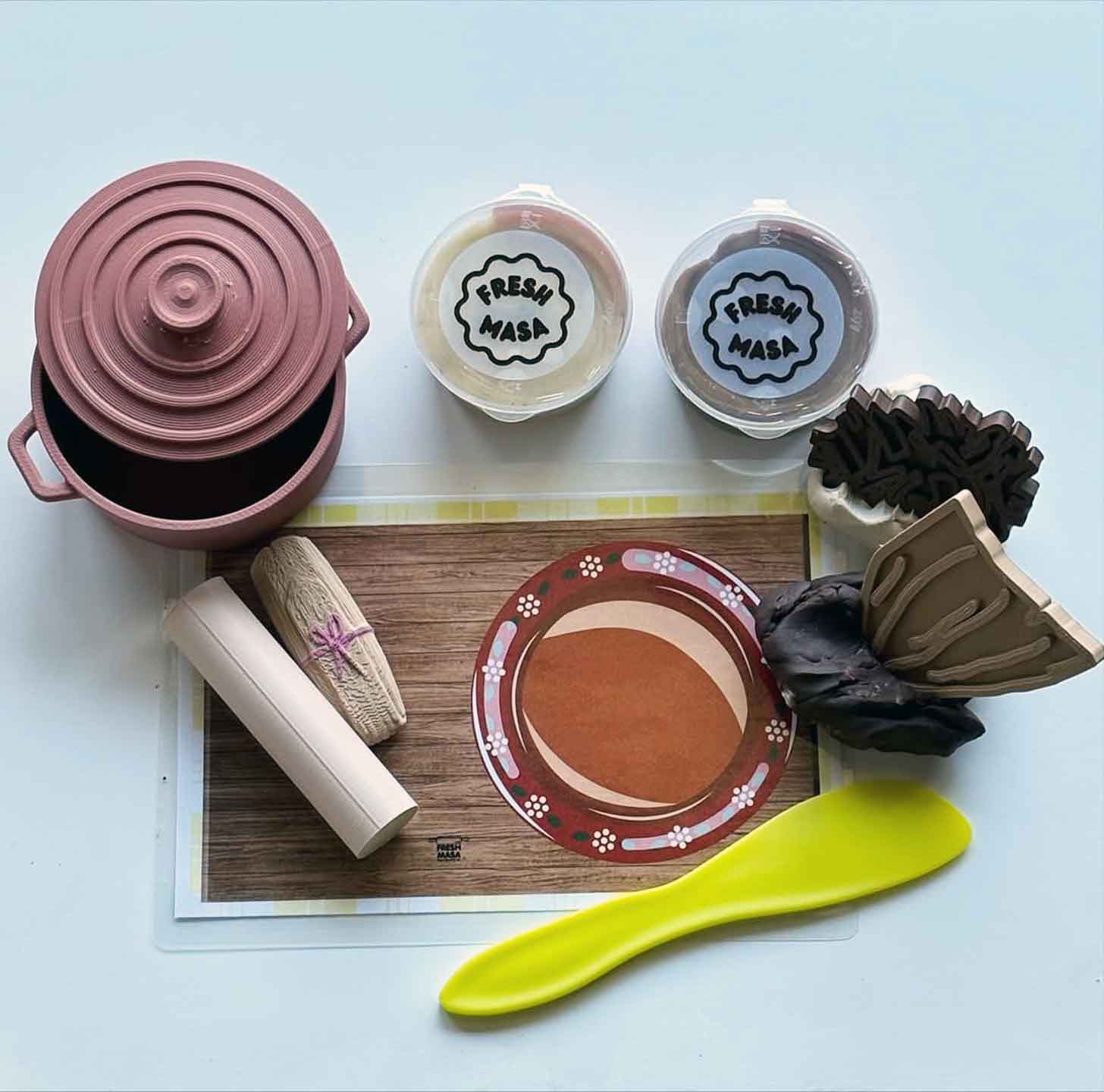 a flay-lay of a kid's Play-Dough set