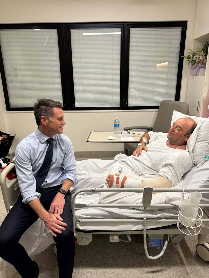 Chris Minns, premier of New South Wales, visits Ahmed el Ahmed in a hospital.