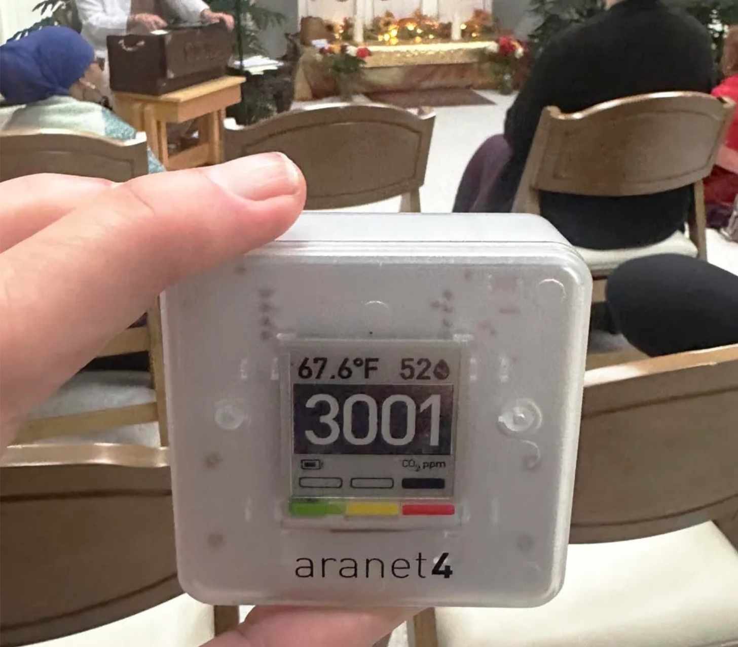 I measured a CO2 concentration of 3,001 ppm in this church – a level high enough to cause headaches and significant spread of respiratory illnesses. The church was running one HEPA until with a clean air delivery rate of about 100 cubic feet per second. Using the CADR calculator for a room with that level of CO2 and 35 people singing, we find that a CADR of 3,600 cubic ft/s would be needed for adequate infection control, according to ASHRAE Standard 241-2023. Thus, an additional 35 HEPA units of that kind would be needed, or four large four-filter Corsi-Rosenthal boxes (but they would make a lot of noise). The additional HEPA filtration would do nothing to reduce the CO2 level, though. This church badly needs to revamp its ventilation system and install an energy recovery ventilator.