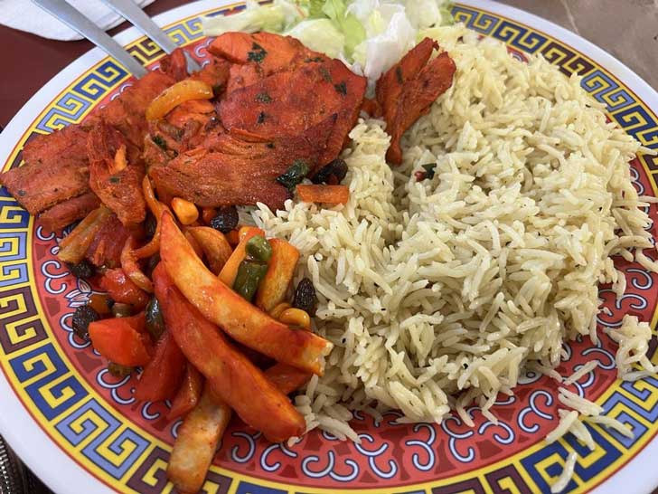 A plate of Somali food — chicken and rice