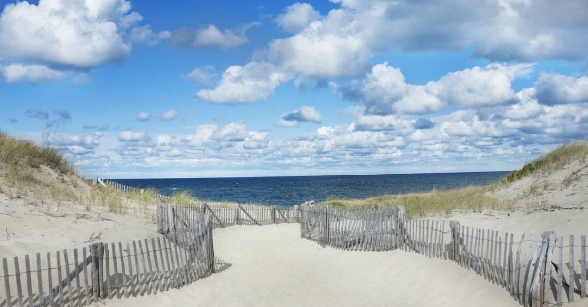 A beach entrance at Cape Cod National Seashore on a sunny blue sky day