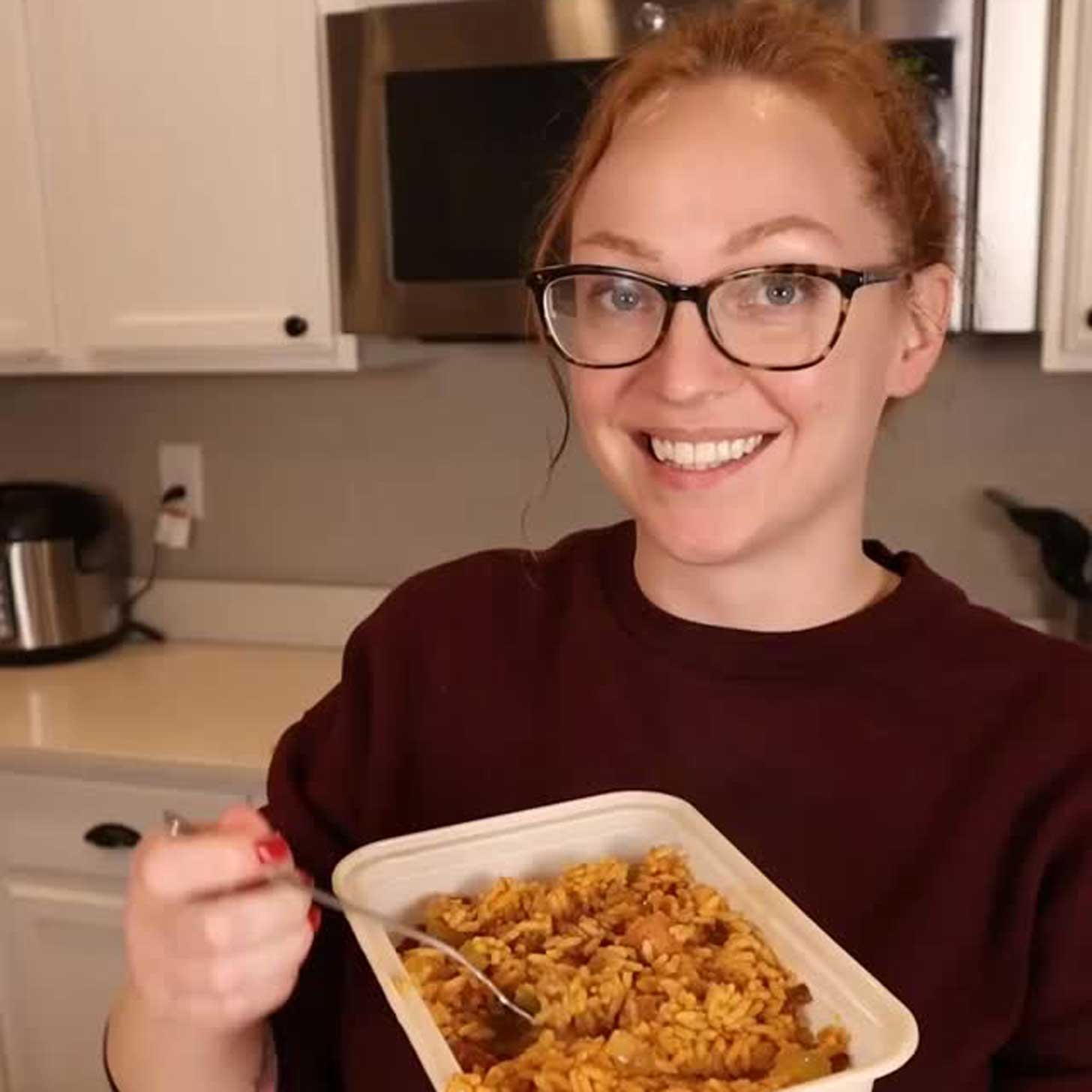 Rebecca Chobat of Dollar Tree Dinners eats a meal in her kitchen