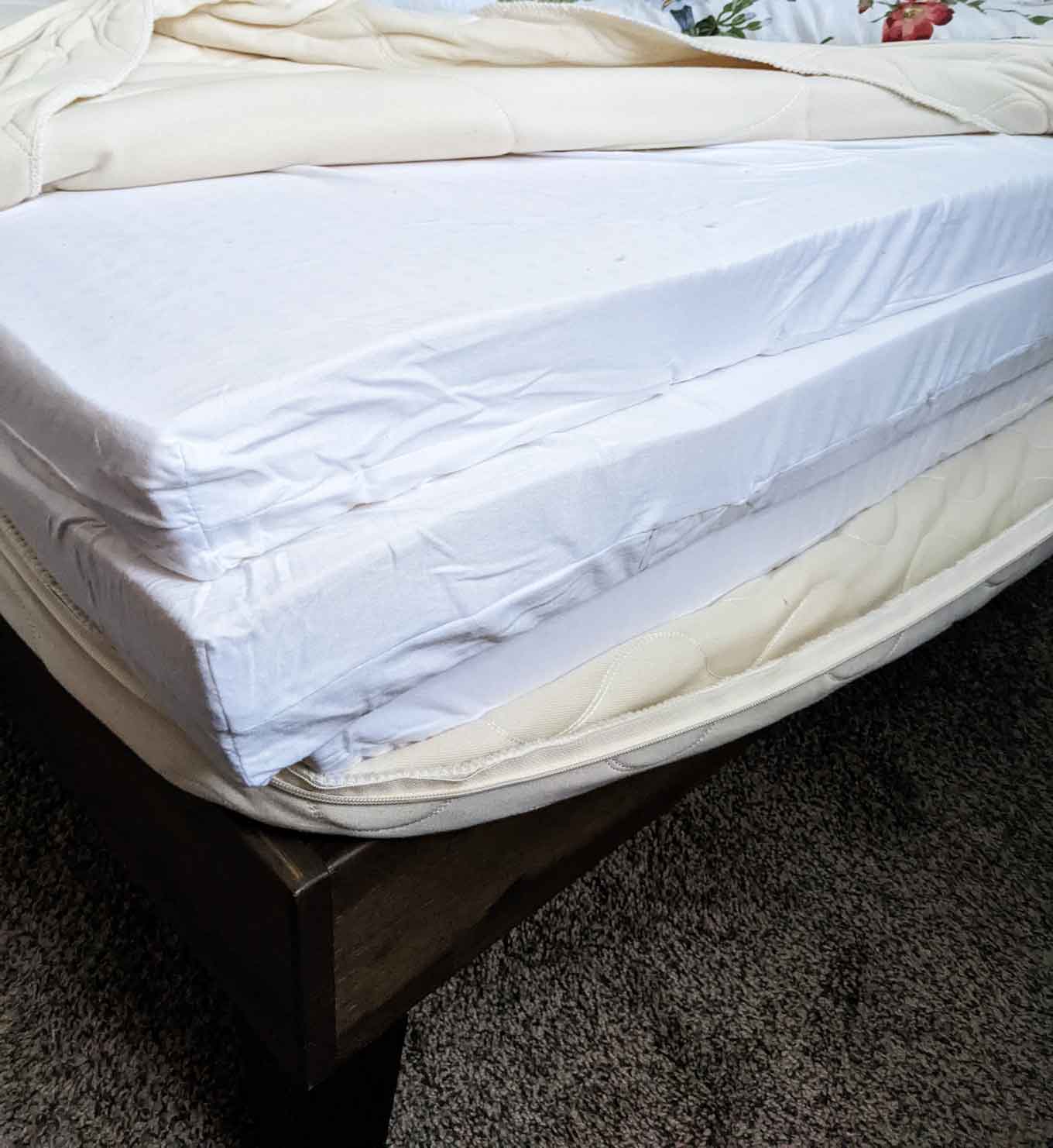 A view of the unzipped Spindle mattress, showing three inner pads
