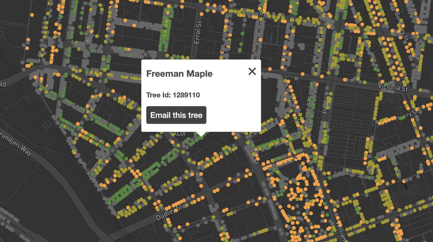 A digital map of Melbourne, Australia includes yellow and green dots representing trees across the city