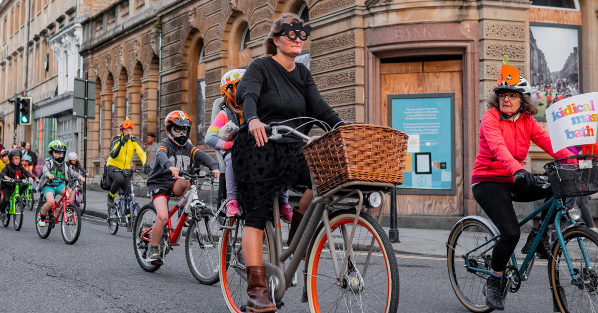 A "bicycle mayor" in Bath, England, leads a group of cyclists through the streets of the city