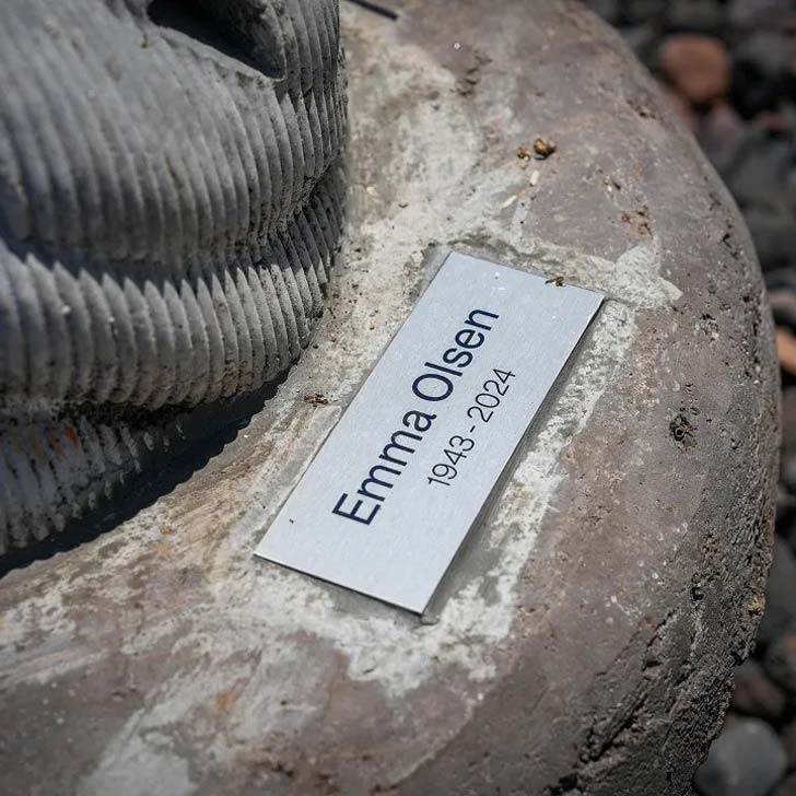 A plaque with someone's name on an artificial reef